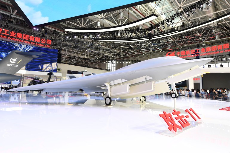 A photo of a Gongji-11 (GJ-11) unmanned stealth combat drone on display.