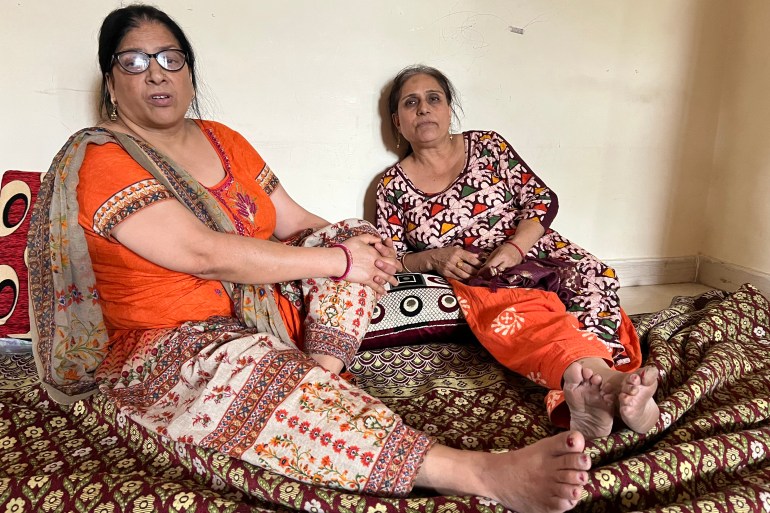 Relatives of Rahul Bhat at their home in Jammu's Durga Nagar.