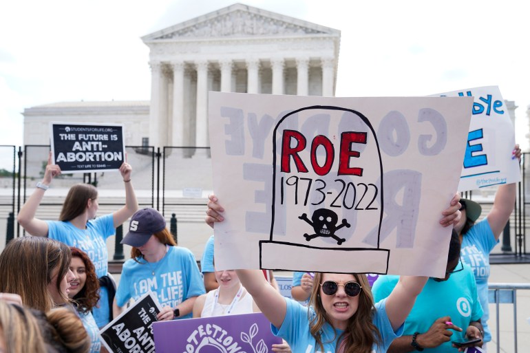 Demonstrators protest against abortion outside the Supreme Court