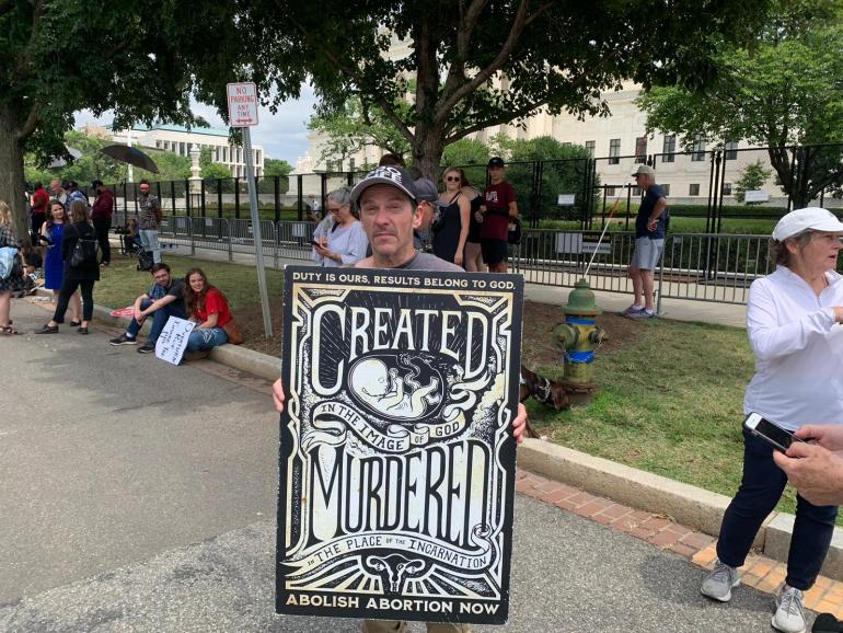 anti-abortion activist outside US Supreme Court