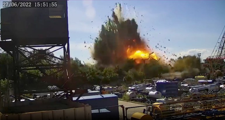 A still image from security camera footage shows an explosion that occurred during a Russian missile attack on a shopping mall at a site believed to be Kremenchuk, Ukraine.