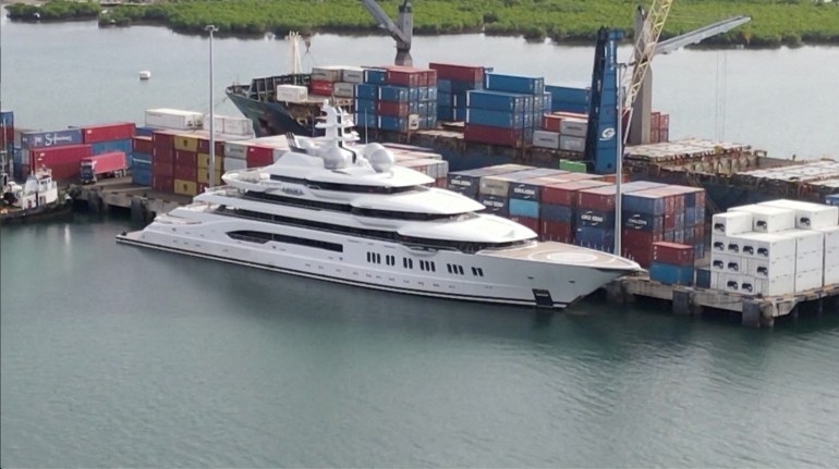 A screen grab from a drone video footage shows Russian-owned superyacht 'Amadea' docked at Queens Wharf in Lautoka, Fiji May 3, 2022