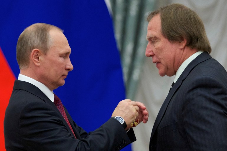 Artistic director of St. Petersburg House of Music Sergei Roldugin (R), pictured with Russian President Vladimir Putin (L)