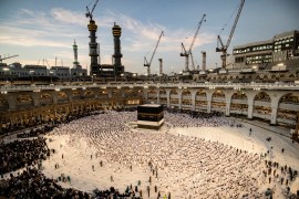 Muslim pilgrims pray around the Kaaba