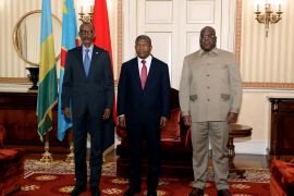 Rwanda President Paul Kagame (L), Angola President Joao Lourenco (C) and Democratic Republic of Congo President Felix Tshisekedi