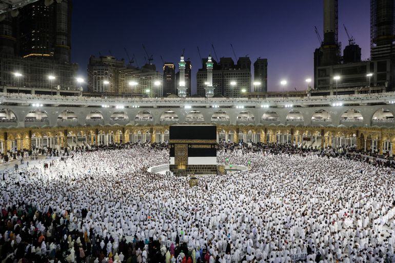 Muslim worshippers and pilgrims pray around the Kaaba, Islam's holiest shrine