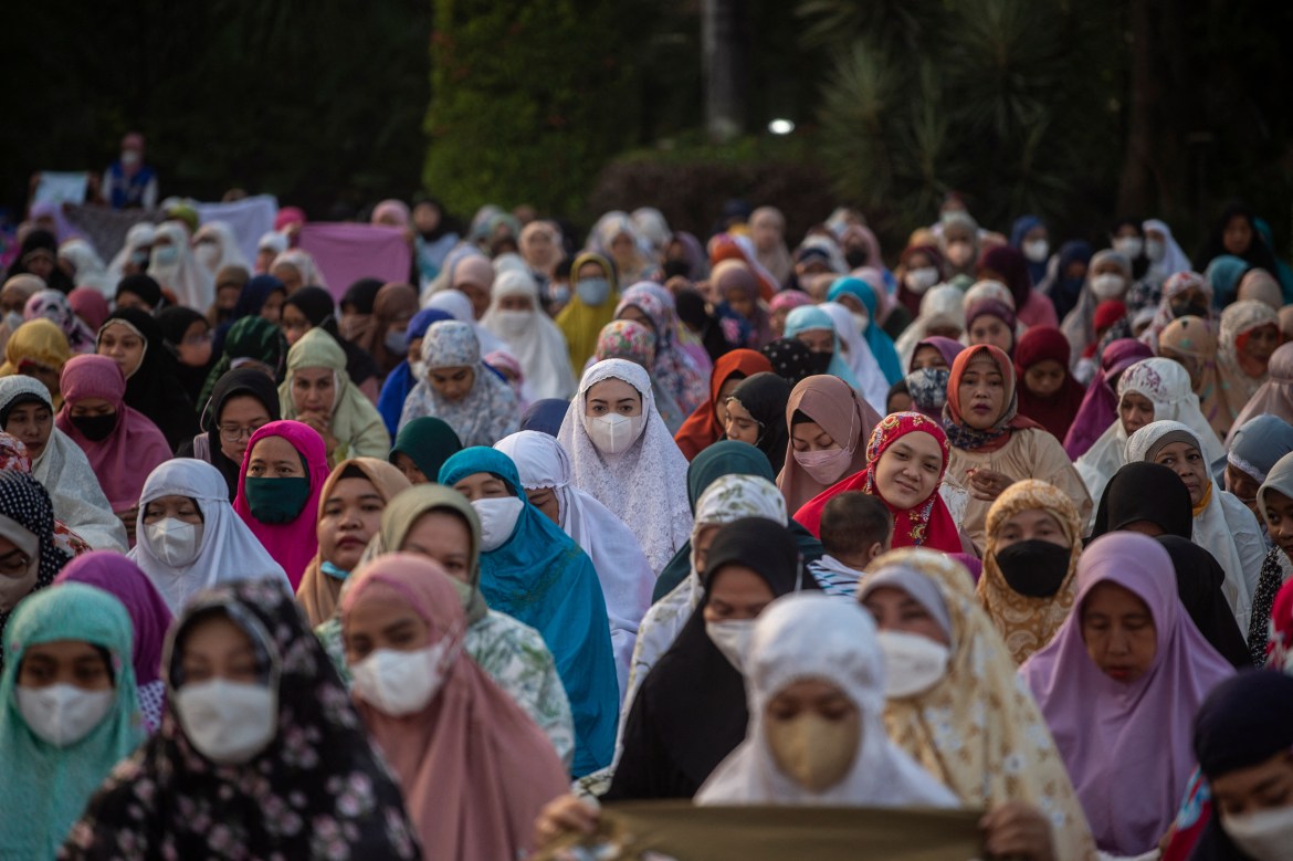 Muslims offer prayers during Eid al-Adha in Surabaya, east Java