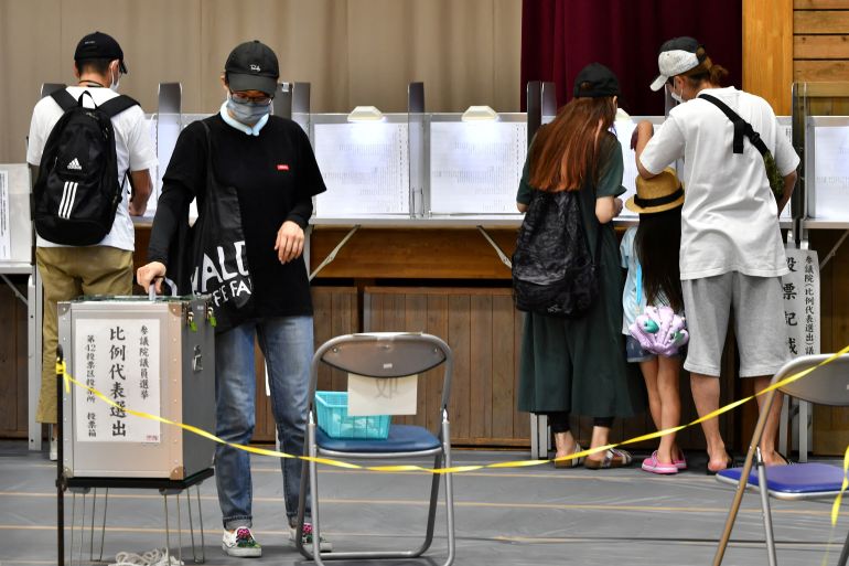 Woman casts her vote