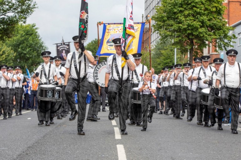 Northern Ireland's Orange Order members march during a parade in Belfast
