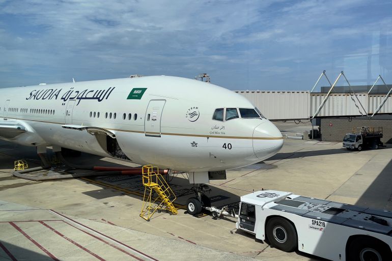 A Saudi Airlines plane is seen at gate at Dulles Washington International Airport (IAD),