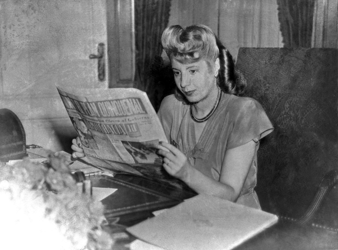File picture taken in 1947 showing Eva Peron reading a newspaper. Eva Peron, known as Evita (1919-1952), the second wife of Argentine President Juan Peron, was a radio and screen actress before her marriage in 1945. She became a powerful political influence and a mainstay of the Peron government. She was idolized by the poor, and after her death, in Buenos Aires, support for her husband waned. (Photo by AFP)