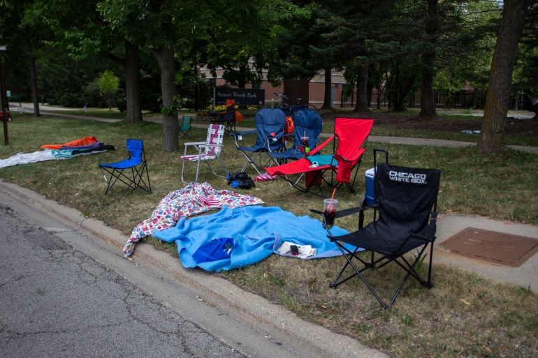 Chairs and blankets left behind along parade route in Highland Park, Illinois.