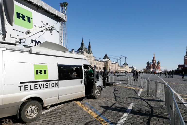 Vehicles of Russian state-controlled broadcaster Russia Today (RT) are seen at Red Square in central Moscow.