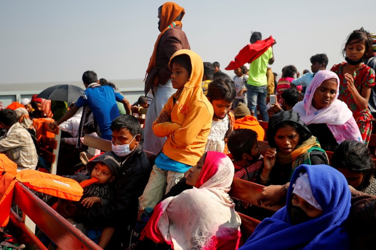 Rohingya crammed onto a boat as they are moved to Bhasan Char island in Bangladesh.