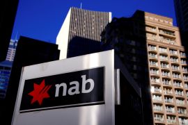 Logo of National Australia Bank on signage in front of a building.