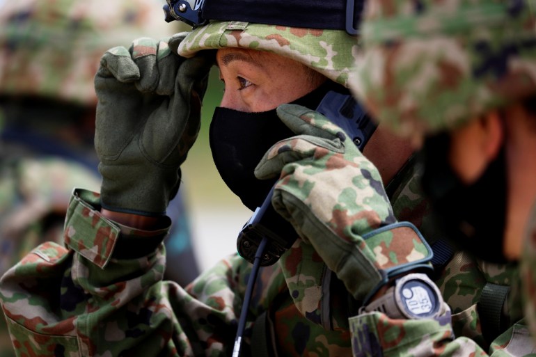A member of Japan's self-defence forces in fatigues during a military exercise