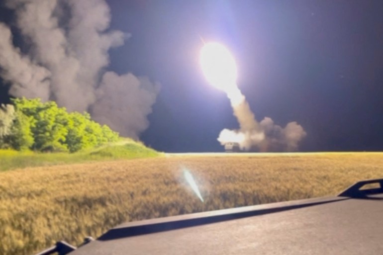 A view shows a HIMARS being fired in an undisclosed location in Ukraine