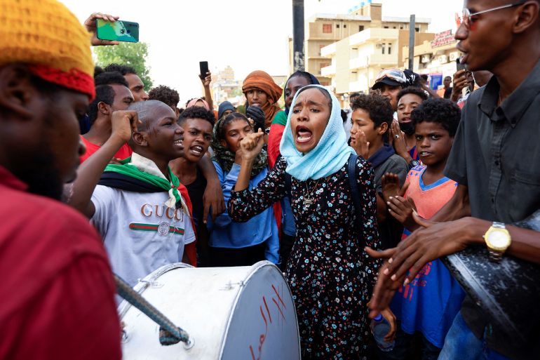Woman shouts during Sudan protest
