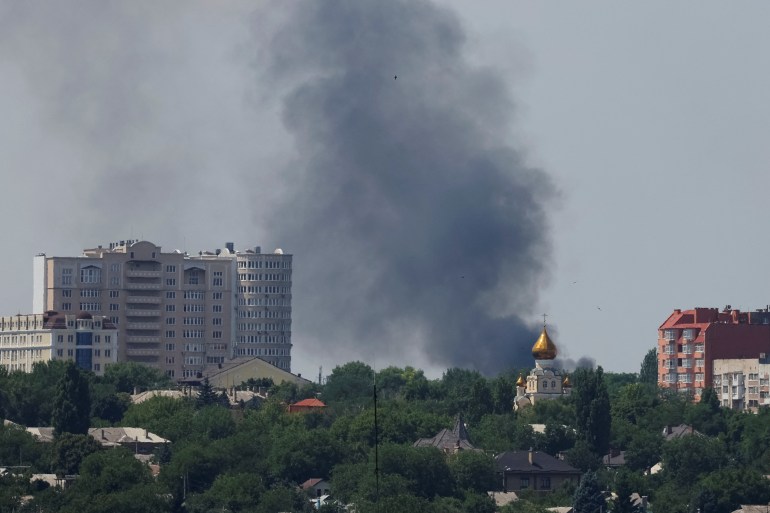 Smoke rises after shelling during Ukraine-Russia conflict in Donetsk, Ukraine on July 6, 2022 [Alexander Ermochenko/Reuters]