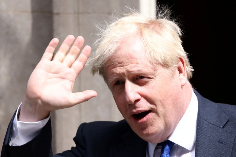 British Prime Minister Boris Johnson walks at Downing Street in London