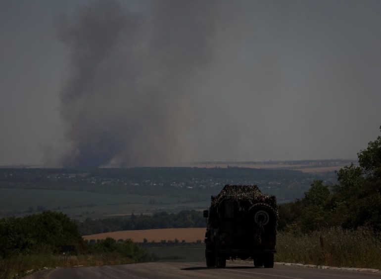 Smoke rises in the sky after shelling, amid Russia's attack, in Donetsk region, Ukraine