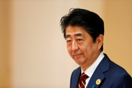 Former Japanese Prime Minster Shinzo Abe tried to encourage more women to enter the workforce [File: Jorge Silva/Reuters]