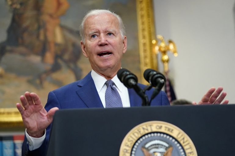 Joe Biden speaks at a podium at the White House