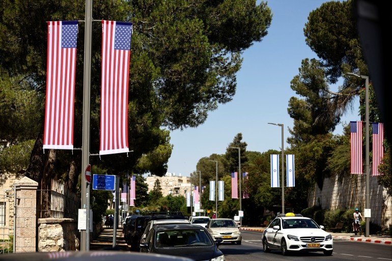 Israeli and American flags decorate the street outside Israeli President residence,