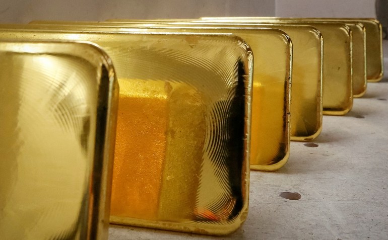 FILE PHOTO: Newly casted ingots of 99.99% pure gold are stored after weighing at the Krastsvetmet non-ferrous metals plant, in the Siberian city of Krasnoyarsk, Russia