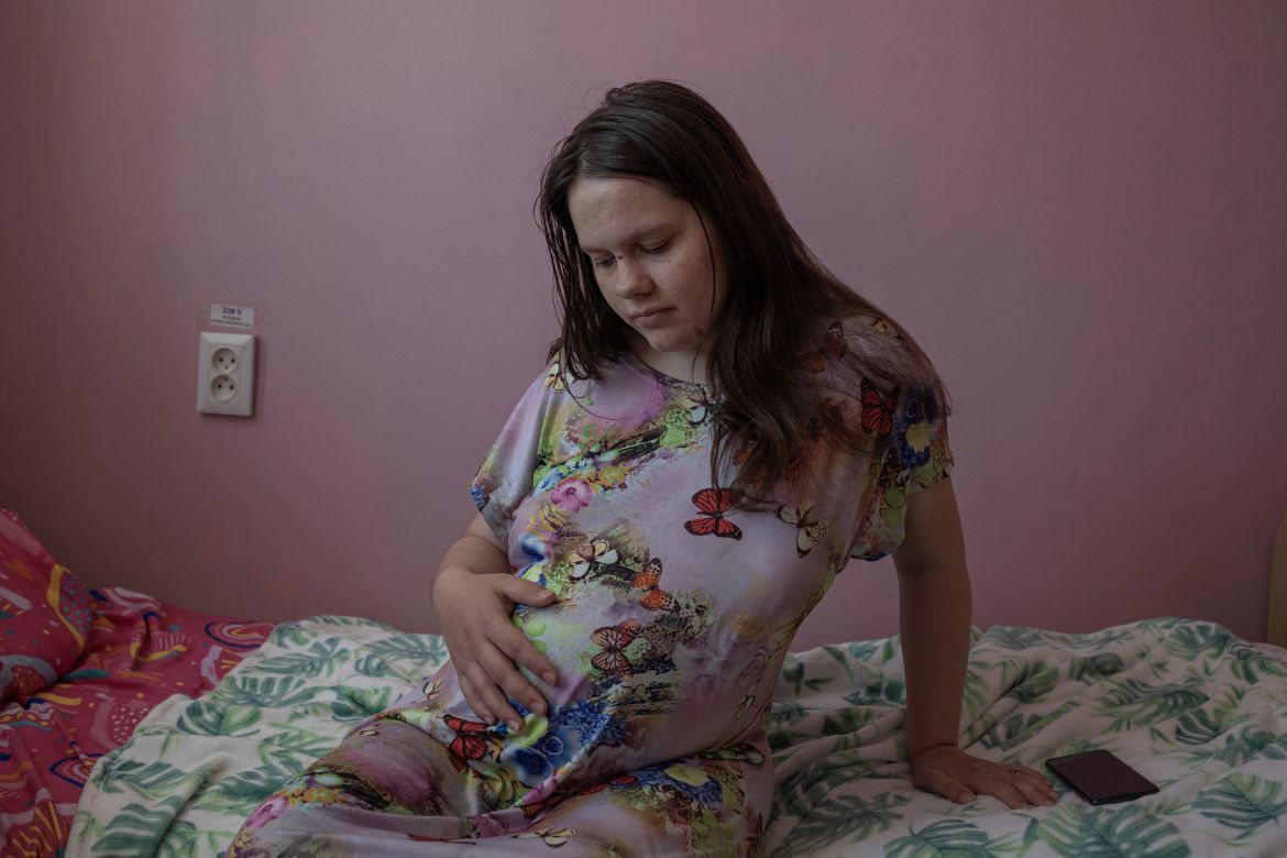 Pregnant Viktoriya Sokolovska, 16, sits inside Pokrovsk maternity hospital