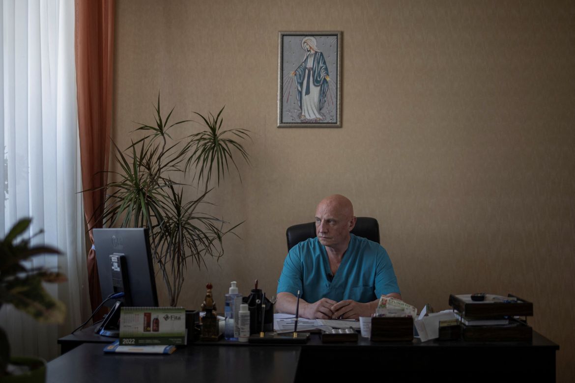 Doctor Ivan Tsyganok, 56, sits at his desk inside Pokrovsk maternity hospital