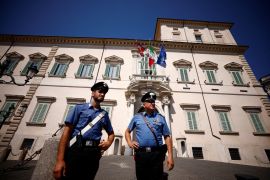 Carabinieri paramilitary police officers stand outside the Quirinale Palace on the day Italian Prime Minister Mario Draghi's coalition government risks collapse after the 5-Star Movement failed to support a parliamentary confidence vote, in Rome, Italy,