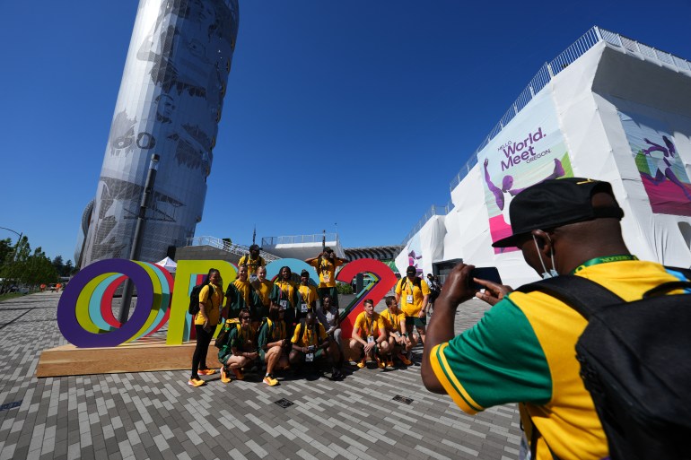 South Africa team members pose for a photo outside the stadium in Eugene, Oregon, before the start of the World Athletics Championships