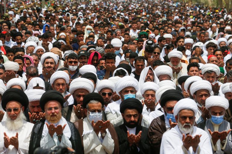 Supporters of Shia cleric Moqtada al-Sadr gather for mass Friday prayer in the Sadr City district of Baghdad