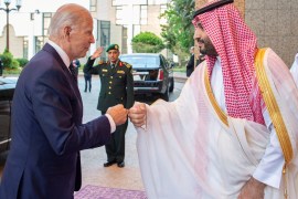 Biden continues to face a chorus of criticism for fist-bumping MBS upon arriving in Jeddah [File: Courtesy of Saudi Royal Court/Handout via Reuters]