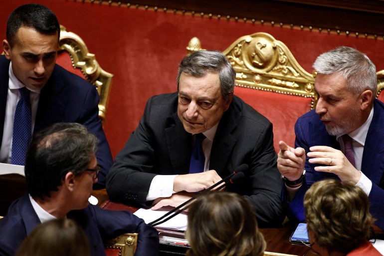 Italian Prime Minister Mario Draghi speaks to his ministers at parliament.