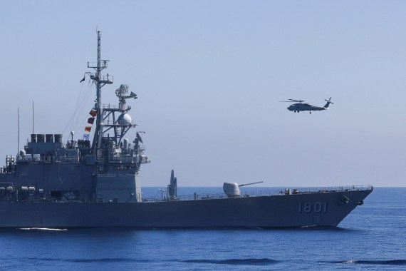 A helicopter above a Taiwanese destroyer during the Han Kuang military exercises off Taiwan's northeastern coast.