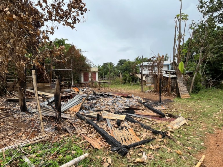Burned down homes amid trees in southeastern Kayah state.