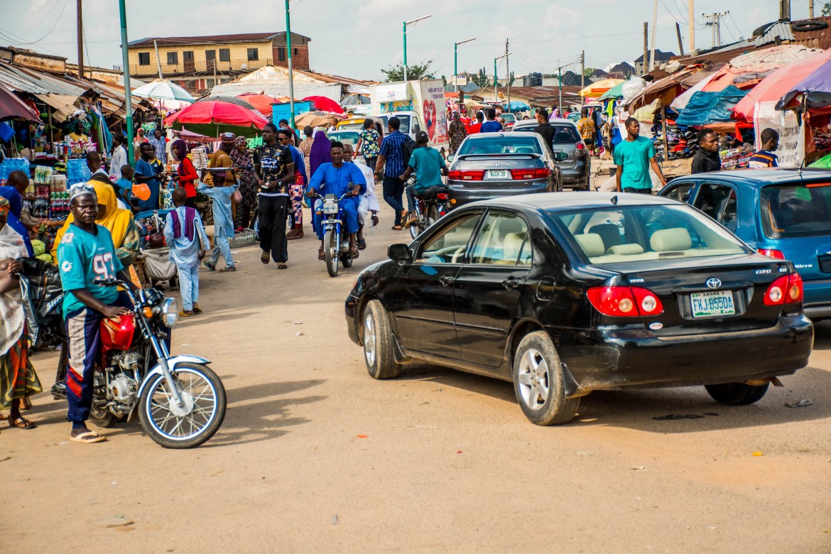 A view of a major intersection at Minna central market, where vendors set up shop to sell handmade goods. “The network is beautiful,” Bunmi, the seamstress, noted. “We have one big market here that we can get our materials.”