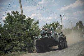 Ukrainian servicemen are seen riding on top of a tank towards the battlefield near the front line in Siversk, Ukraine [File: Narciso Contreras/Anadolu Agency]