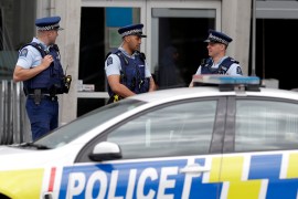New Zealand police are seen standing guard