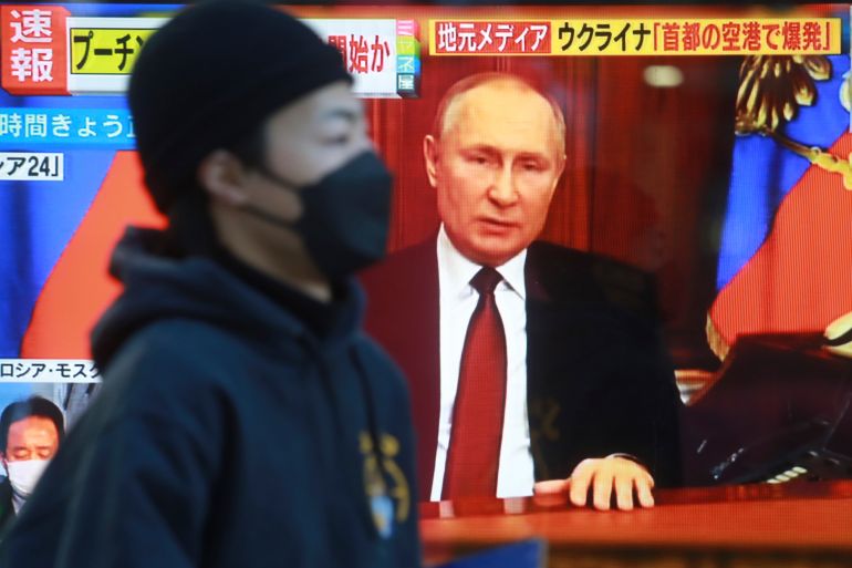A TV screen with image of Russia's President Vladimir Putin in Tokyo on Feb. 24, 2022 as Russian forces intensified its assault on Ukraine [File: Koji Sasahara]