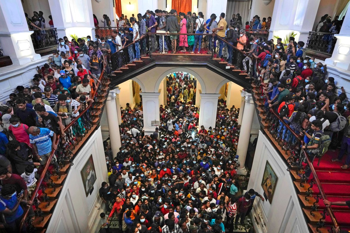 People throng President Gotabaya Rajapaksa’s official residence for the second day after it was stormed in Colombo
