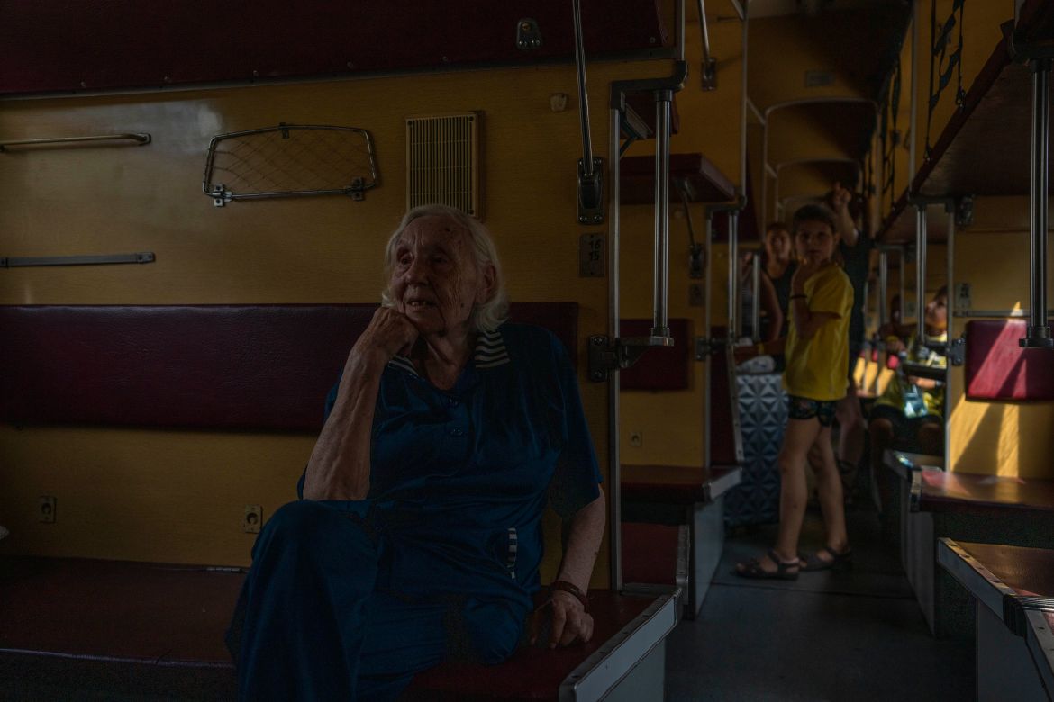 Ninety-one-year-old internally displaced woman from Sloviansk, who was a Russian language teacher, Iraida Vorobiova, sits on the train at the Pokrovsk train station heading to Dnipro, Donetsk region, eastern Ukraine,