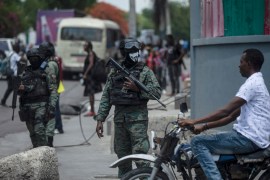 Armed forces stand in an area of state offices in Haiti's capital, Port-au-Prince