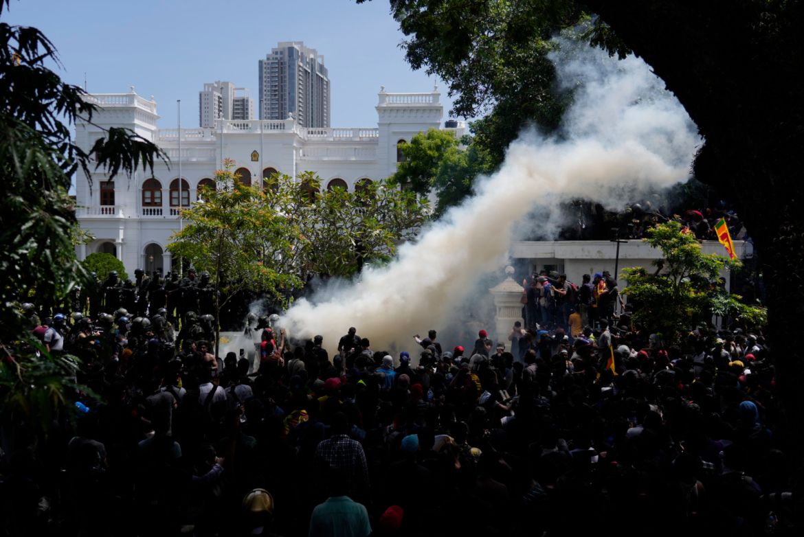 Police use tear gas as Sri Lankan protesters storm the compound of Prime Minister Ranil Wickremesinghe's office