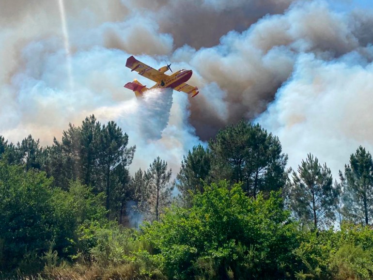 Canadair plane fighting wildfire near La Teste-de-Buch, southwestern France,