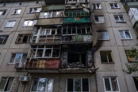 A five-story residential building damaged from a rocket attack on a residential area, in Kramatorsk, eastern Ukraine, Tuesday, July 19, 2022.