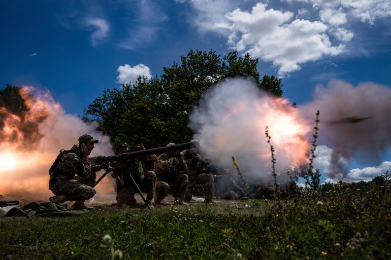 Ukrainian servicemen shoot with SPG-9 recoilless gun during training in Kharkiv region