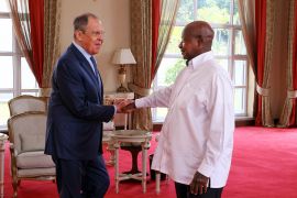 Russian Foreign Minister Sergey Lavrov, left, and Ugandan President Yowerei Museveni